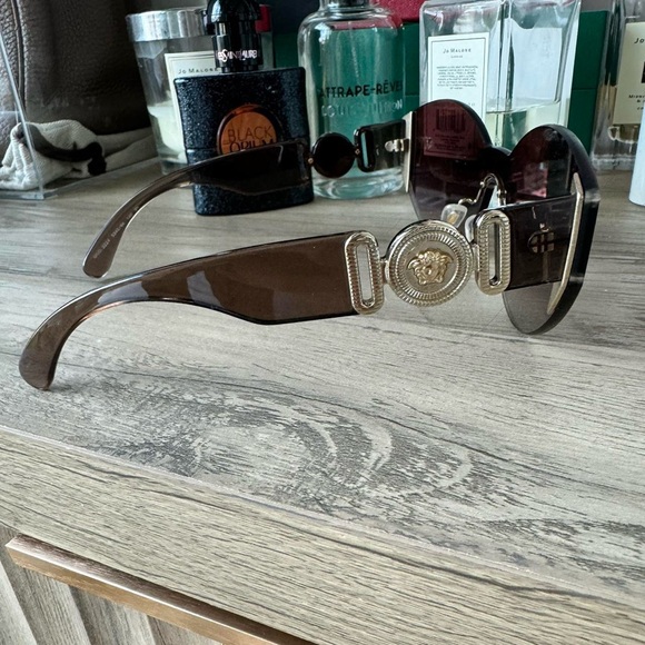 Brown oversized square sunglasses with gradient lenses and thick temple arms